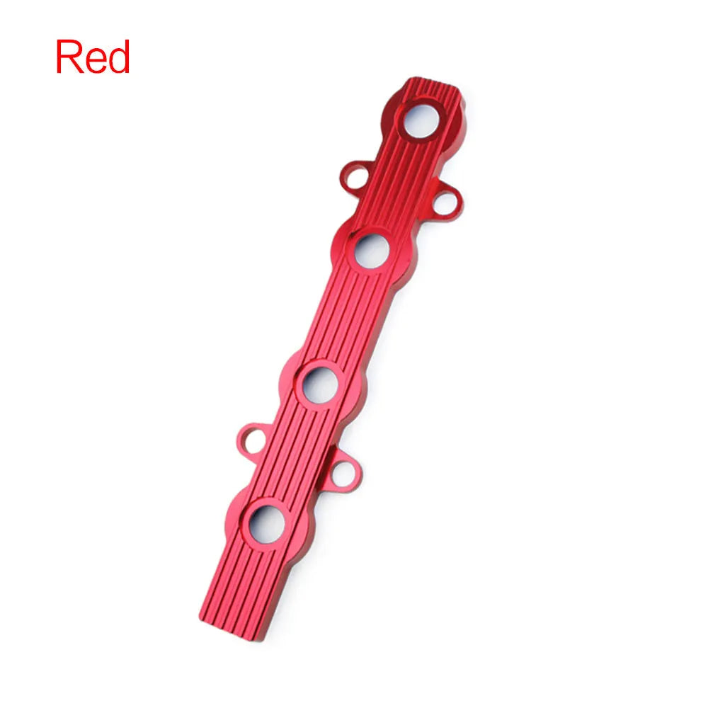Aluminium engine housing panel in blue, red, and silver colours, showing versions with and without holes.