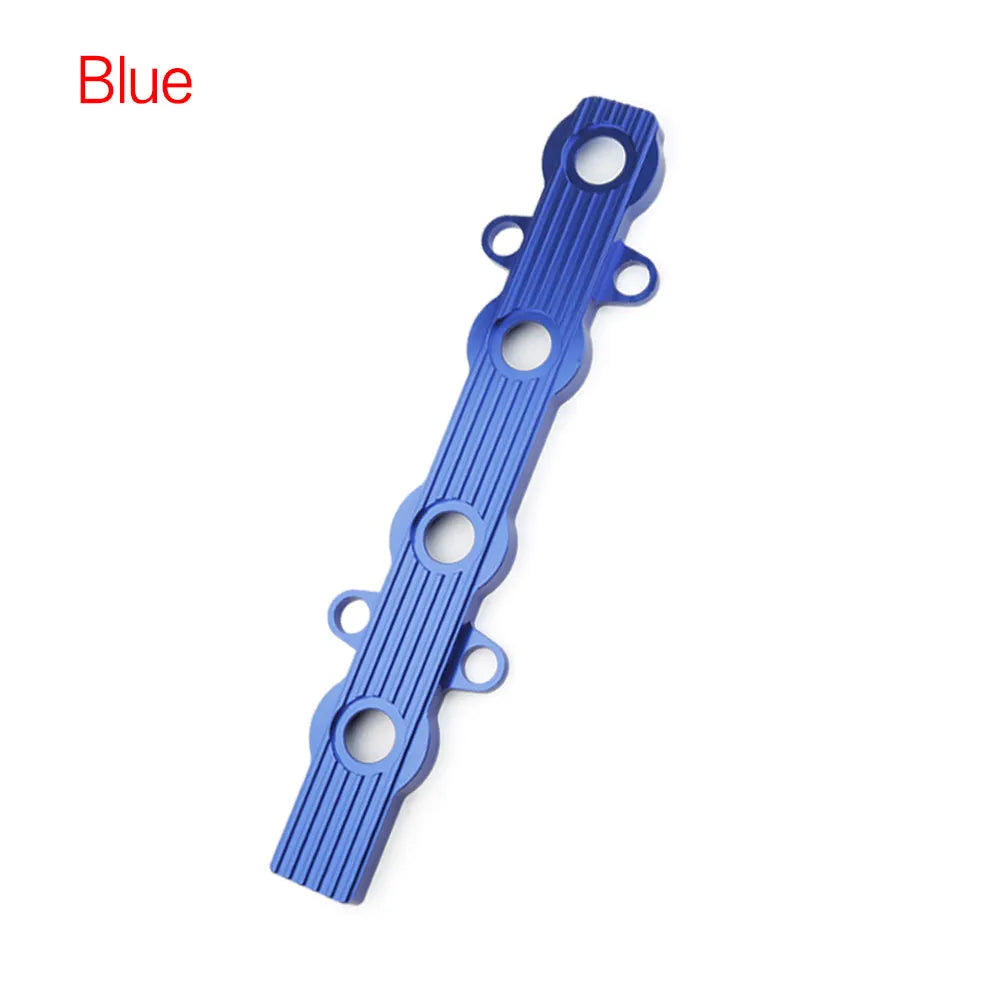 Aluminium engine housing panel in blue, red, and silver colours, showing versions with and without holes.