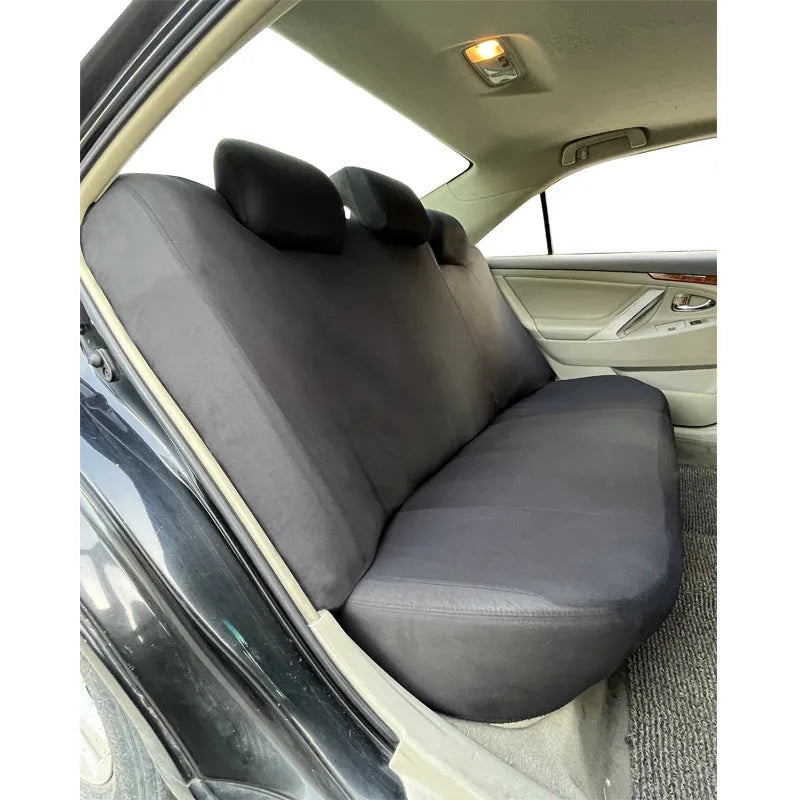 Polyester eyelet-stitch car seat cover set shown in available colours: blue, red, black, and grey.