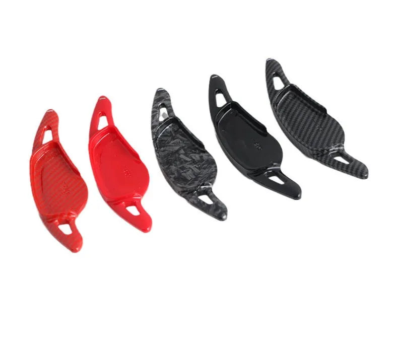 Carbon fibre steering wheel paddle shifter modification kit in black carbon finish