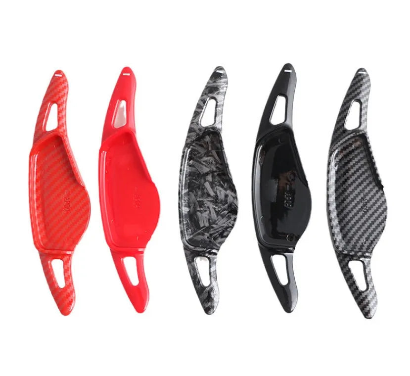 Carbon fibre steering wheel paddle shifter modification kit in black carbon finish