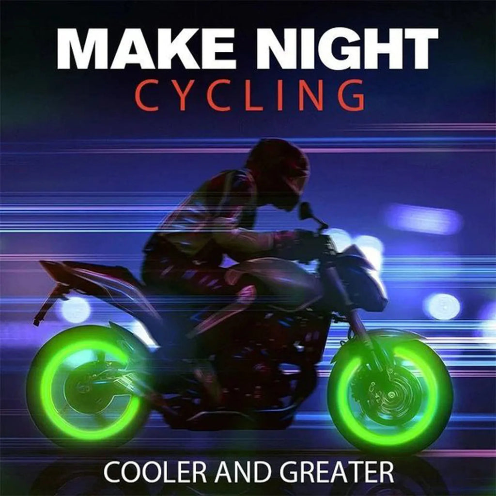Pack of multicolour LED luminous tyre valve caps on a car wheel valve stem.