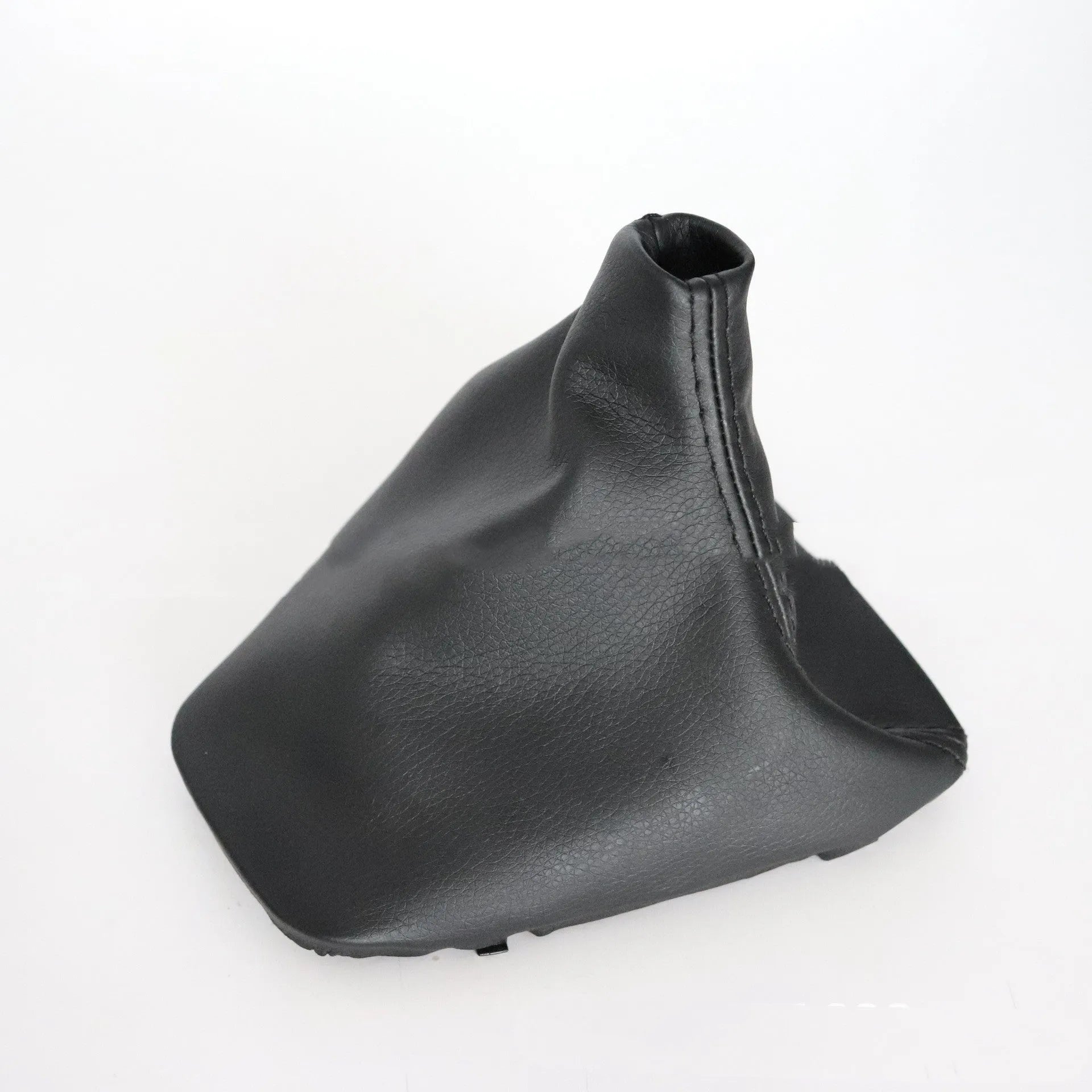Black PU leather gear dust cover shown fitted on a BMW 3 Series manual gear shift console.
