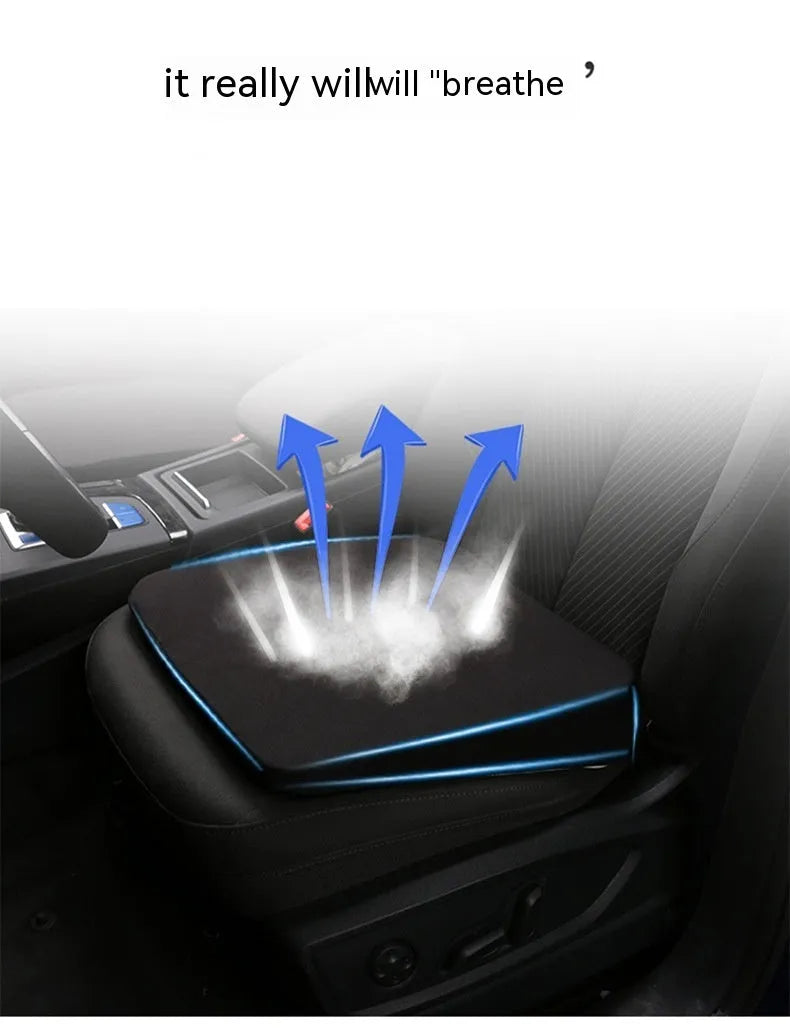 Black rectangular car seat cushion with 6cm thickness on a car seat.