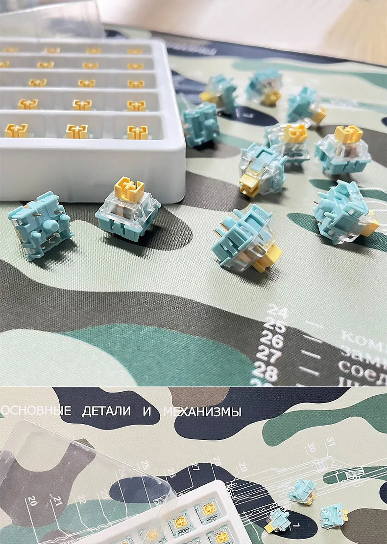 36 Tiger Mo Sea Salt Lemon PRO Mute linear silent mechanical keyboard switches arranged in a grid.