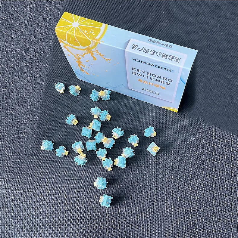 36 Tiger Mo Sea Salt Lemon PRO Mute linear silent mechanical keyboard switches arranged in a grid.
