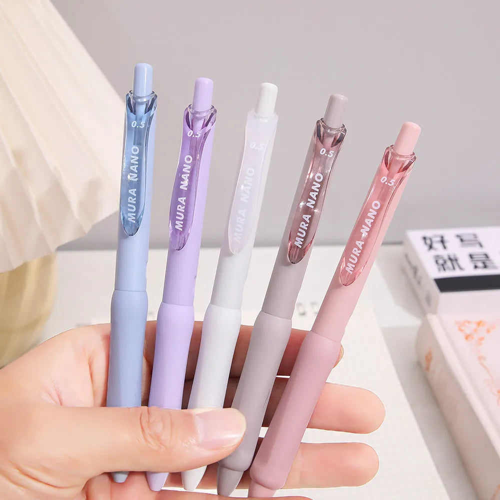 0.5mm Macaron colour press gel pen in smoked brown, white, and pink options.