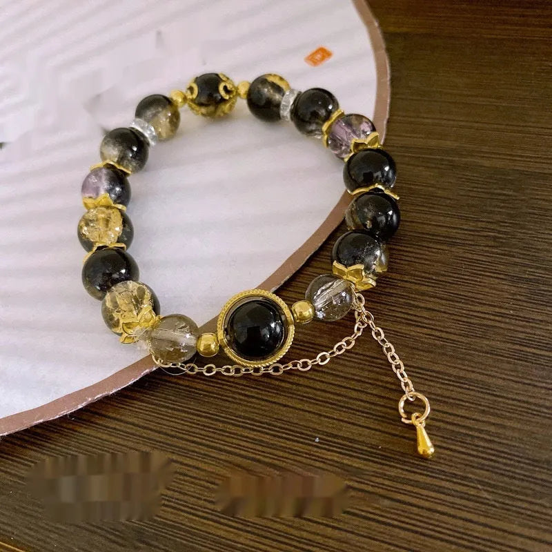 Handmade Chinese style glass bracelet with bamboo joint beads in a red Lvzhu Duobao design.