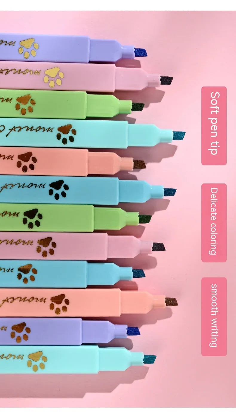 Box of six cat's paw shaped fluorescent marking pens in assorted colours with oblique nibs.