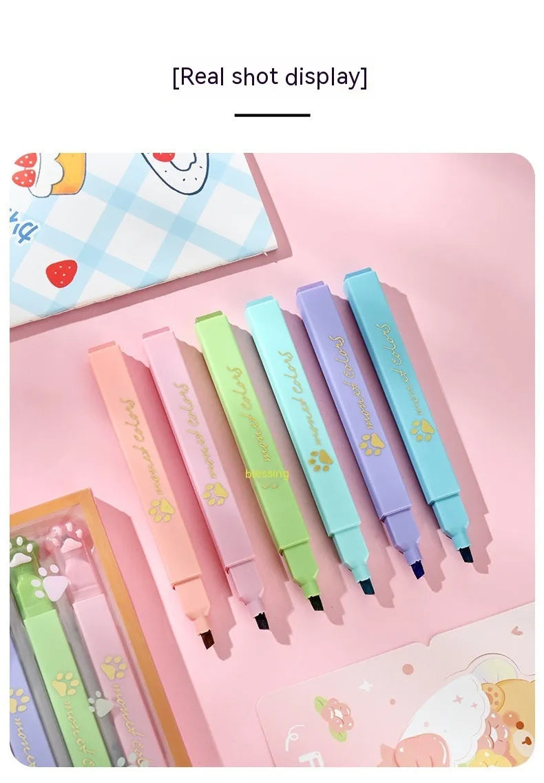 Box of six cat's paw shaped fluorescent marking pens in assorted colours with oblique nibs.