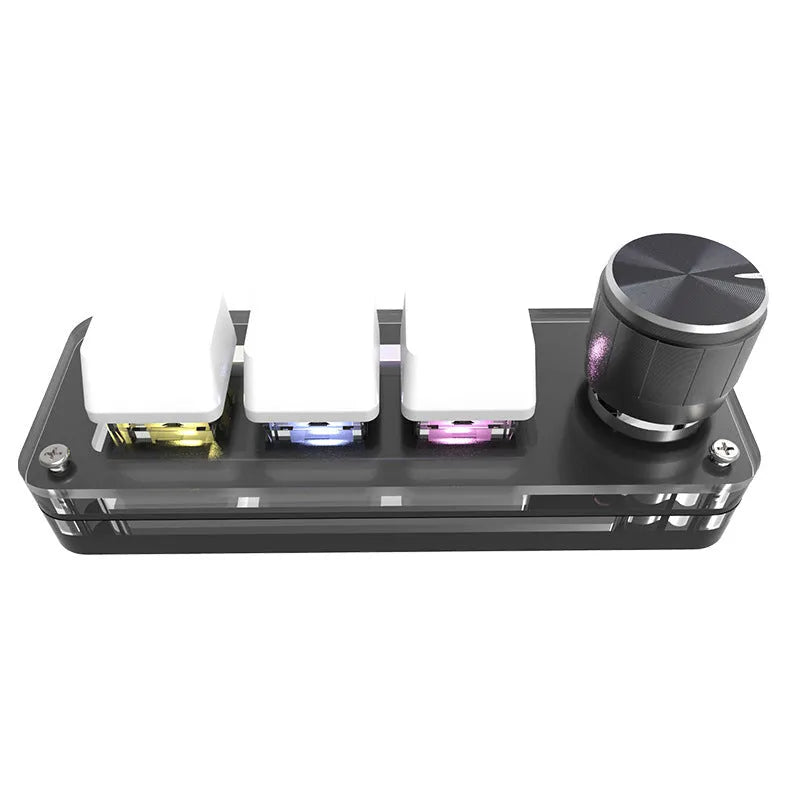 Black custom keypad with RGB backlit keys for copy and paste functions on a desk