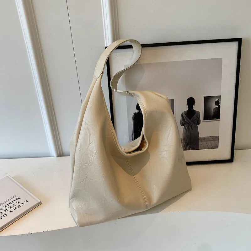 Casual PU leather shoulder bag with large capacity and sandwich pocket design in street trend style