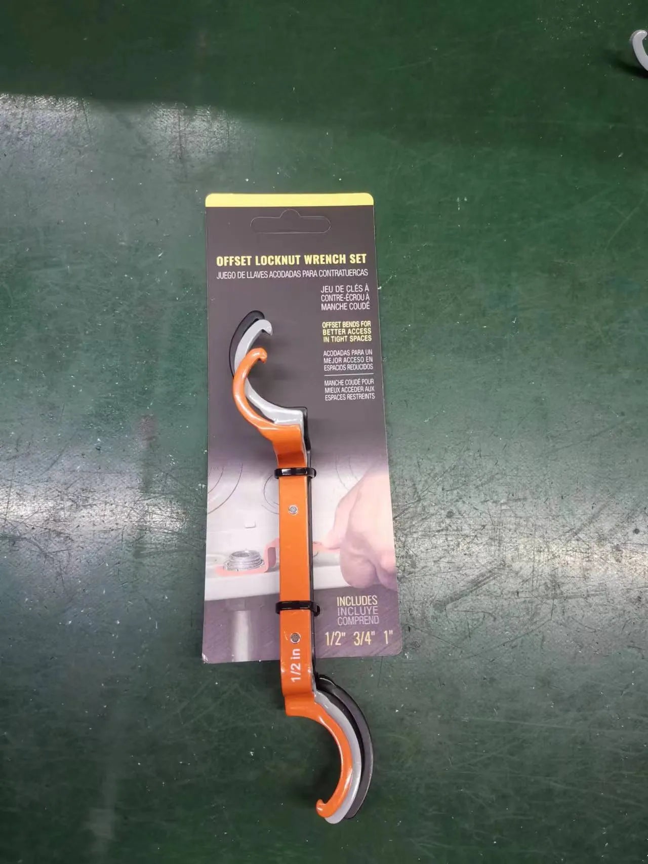 Three-piece magnetic suction wrench kit showing orange, grey, and black tools with different dimensions