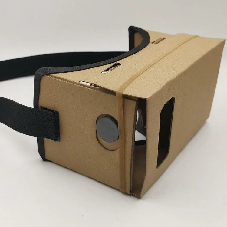 Pink and white cardboard VR glasses headset for smartphones, showing lenses, head strap, and magnetic button.