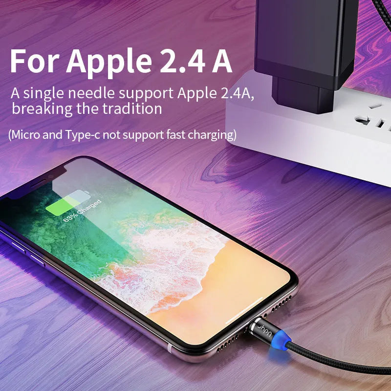 Black magnetic data cable with interchangeable Apple, Android, and USB-C magnetic heads on a table.