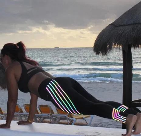 Women's black workout leggings with night glowing print and high-waist design