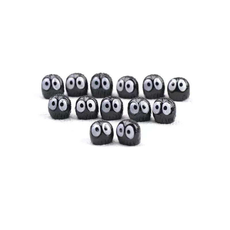Black resin briquette car decorations with cartoon styling for dashboard customisation