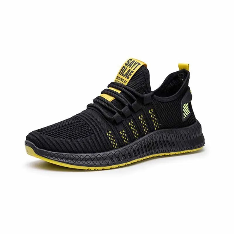 Men's low-top black casual sports shoes with cross strap detail and Flying Weave upper on a wear-resistant sole.