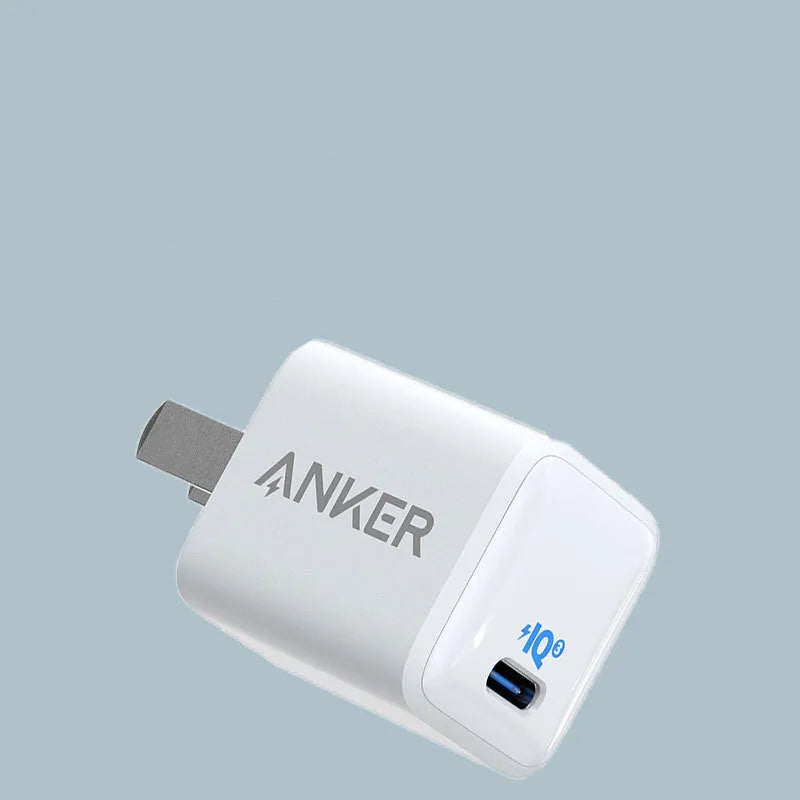White 18W USB travel charger for mobile phones with fast charge capability