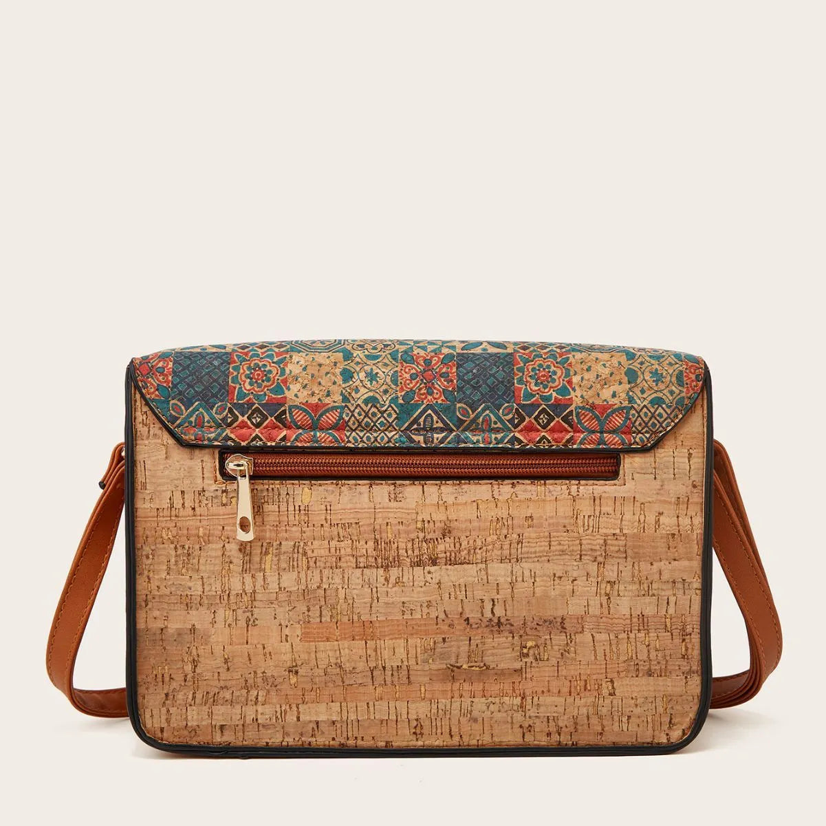 Women's large crossbody bag in a printed PU material with a single shoulder strap.
