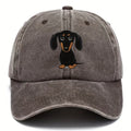 Retro washed blue cotton baseball cap with a printed dachshund design on the front and a peaked brim.