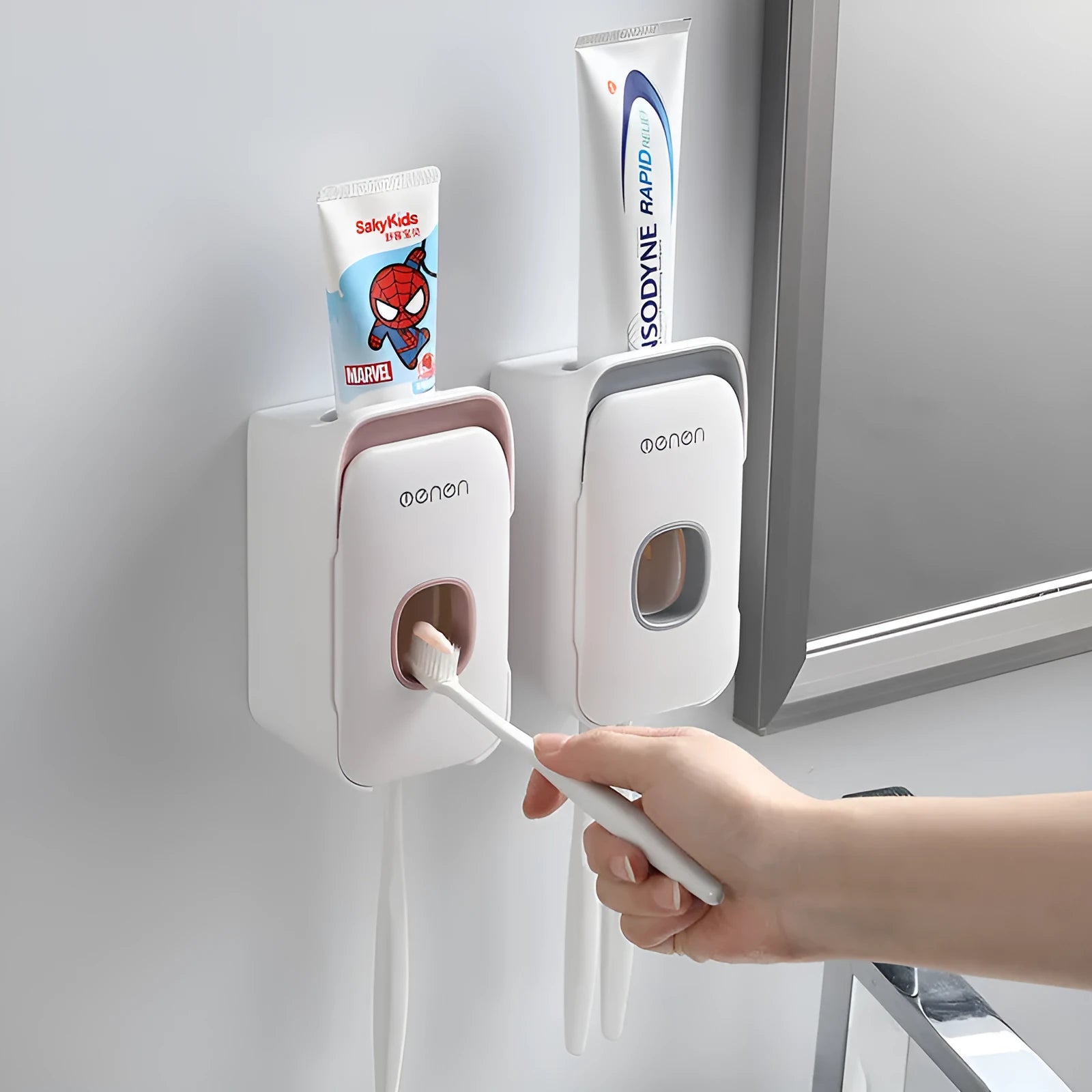 Wall-mounted automatic toothpaste dispenser in blue colour with touch sensor.