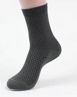Men's bamboo fibre socks showing small square pattern in one of five available colours.