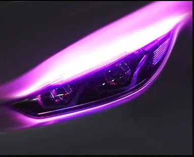 Flexible silicone car LED daytime running light strip with flowing turn signal animation mounted on headlight.