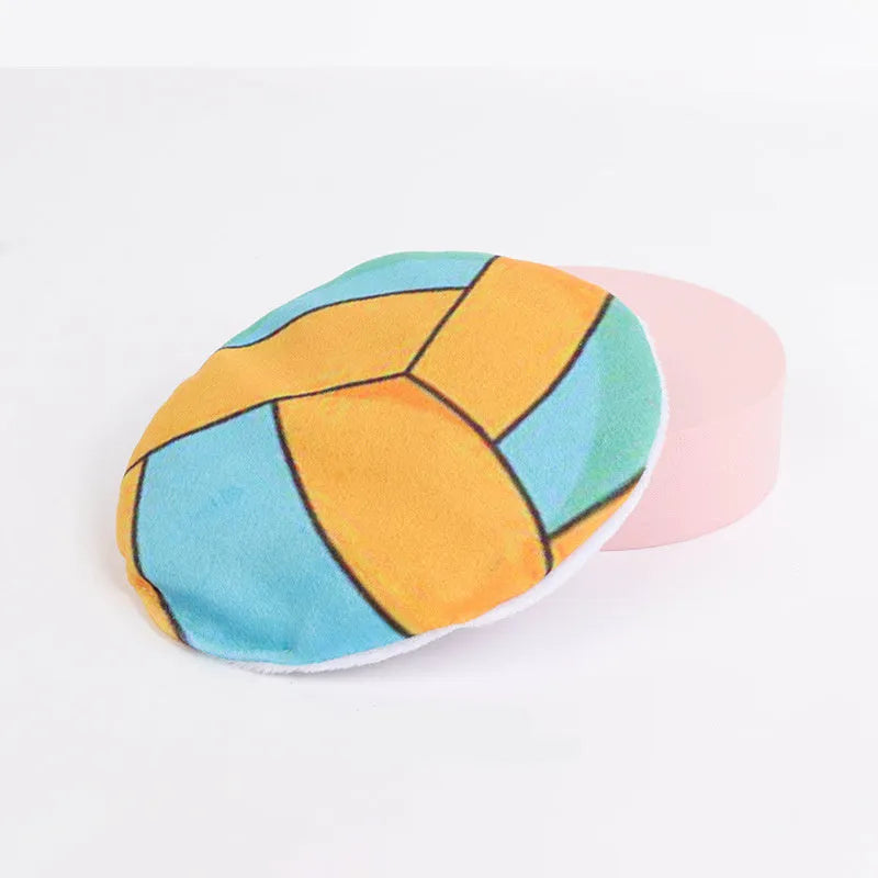 Plush cat toy disc with sports ball pattern containing catnip and crinkle sounds