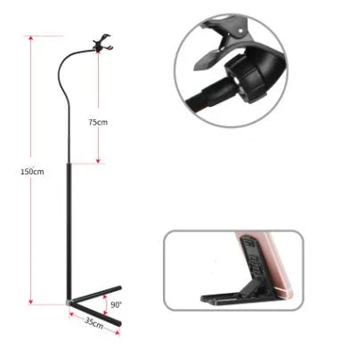 Black mobile phone bed bracket mounted on bedside with phone secured in universal folder for hands-free viewing
