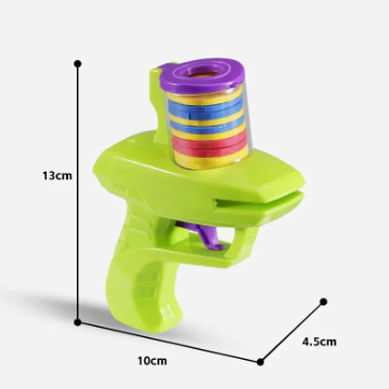 Green or purple plastic cat toy launcher with soft foam discs for interactive play.