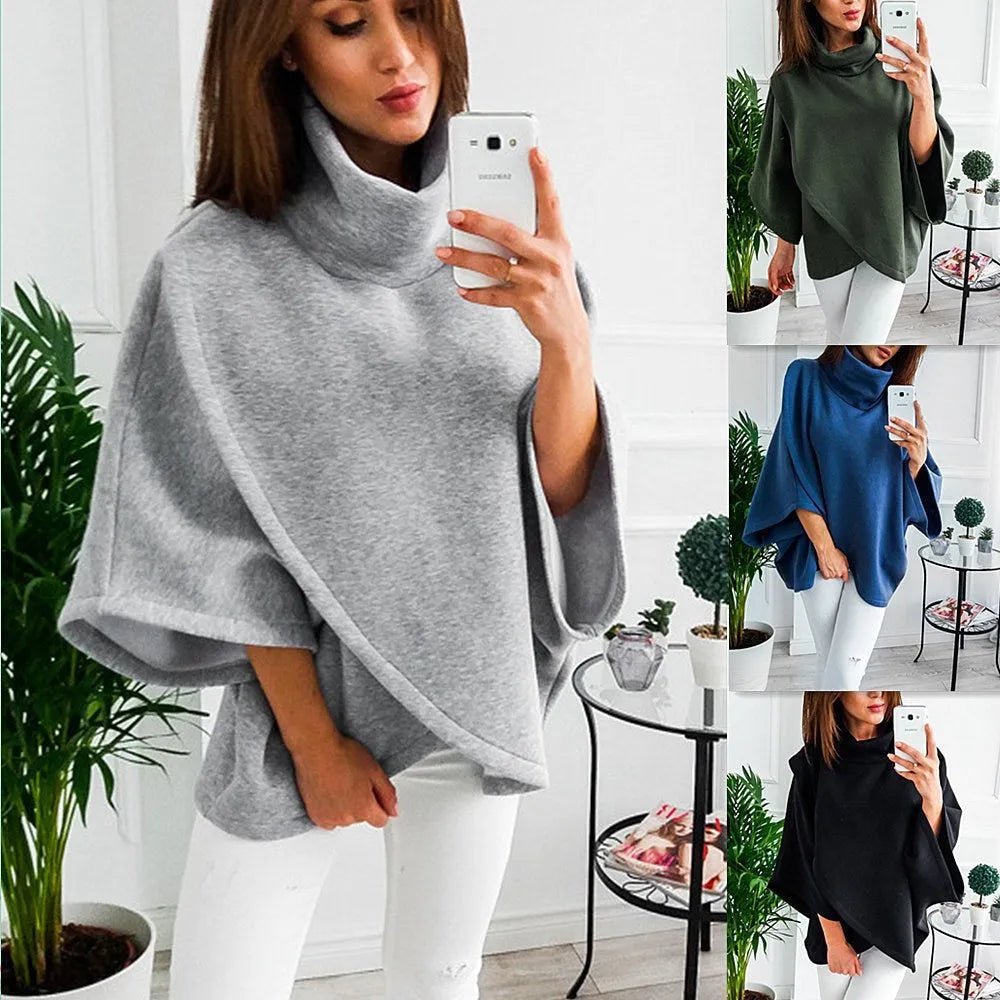 Women's long black batwing sleeve cardigan sweatshirt with three buttons and stitching detail.