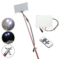 White LED fishing rod light with telescopic pole and remote control on a 12V battery for outdoor use