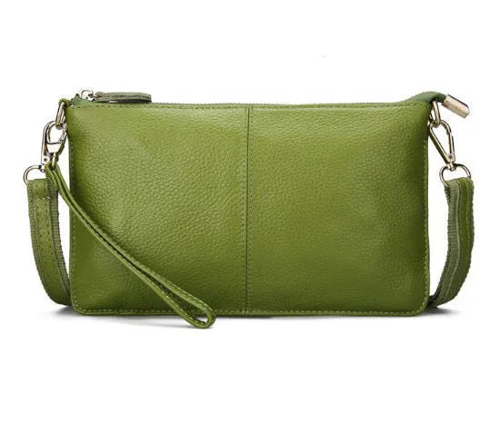 Structured cowhide leather lady slant bag showing front zipper compartment and dual strap options
