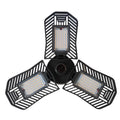 Waterproof industrial foldable LED garage lamp with die-cast aluminium housing shown in a workshop setting.