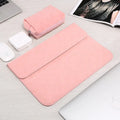 Frosted laptop sleeve in deep grey for MacBook Pro showing zippered opening and abrasive texture