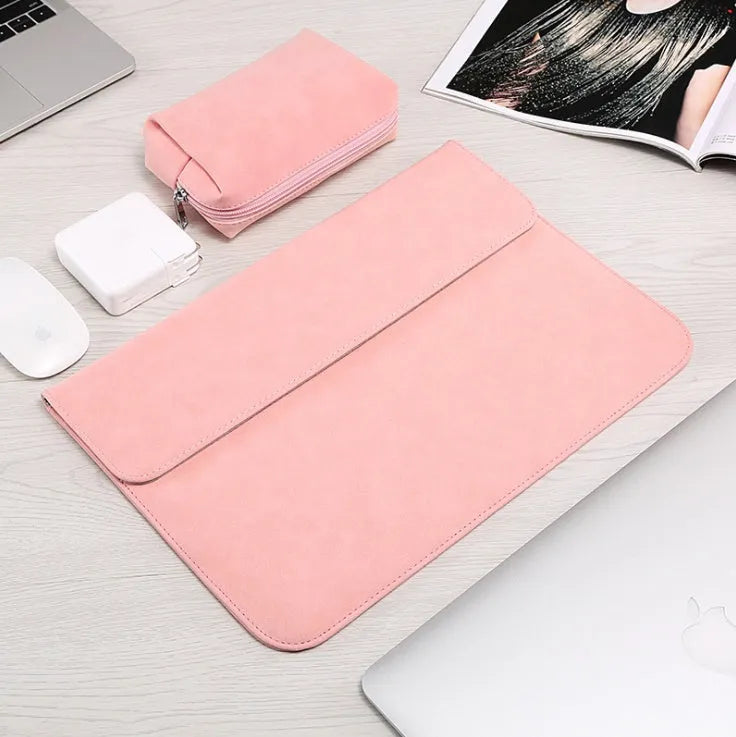 Frosted laptop sleeve in deep grey for MacBook Pro showing zippered opening and abrasive texture