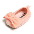 Winter warm cotton baby shoes with suede upper, elastic band, in brown, on a white background