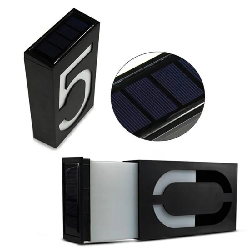 Solar powered house number light with LED illumination and waterproof housing for outdoor installation