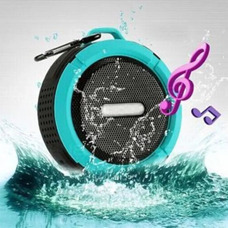 Waterproof portable Bluetooth speaker in multiple colours with mountaineering buckle attachment