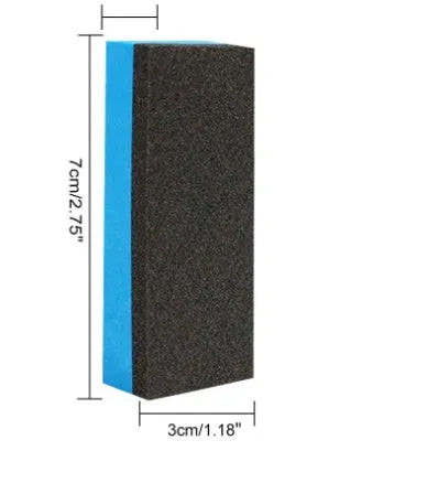 Car iron powder rust remover spray bottle with blue sponge and towel on a car surface.