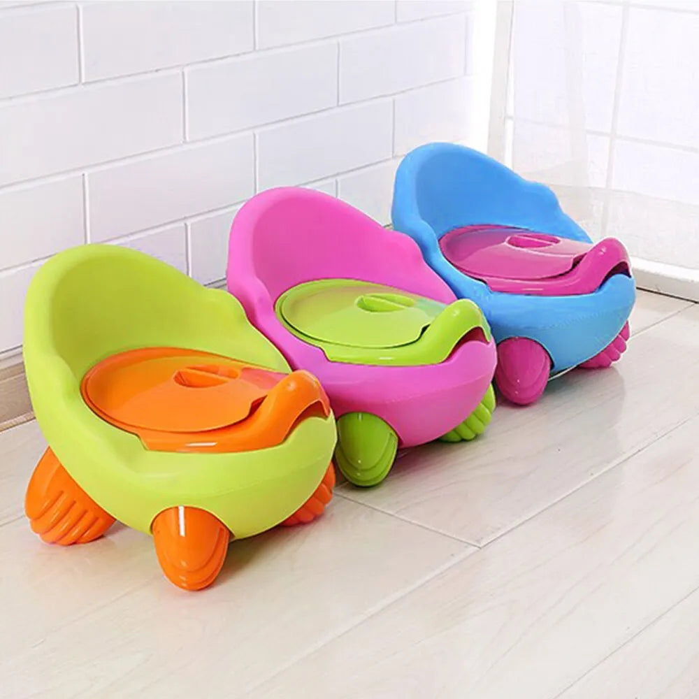 Cartoon-themed baby toilet training stool with splash guard in blue PP plastic