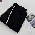 Men's loose fit straight-leg casual pants with drawstring waist in various colours