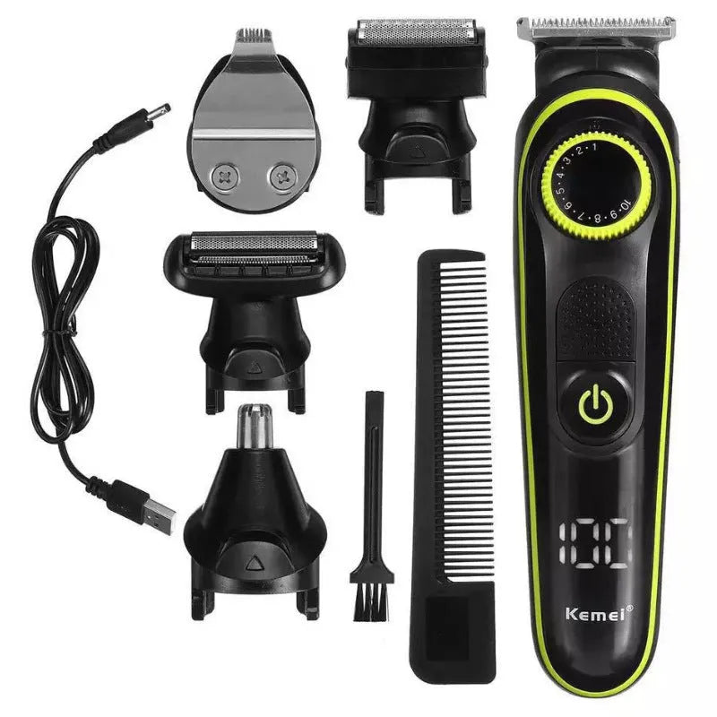 Black KM-696 USB rechargeable electric hair clipper set with stainless steel blades and accessories on a cloth