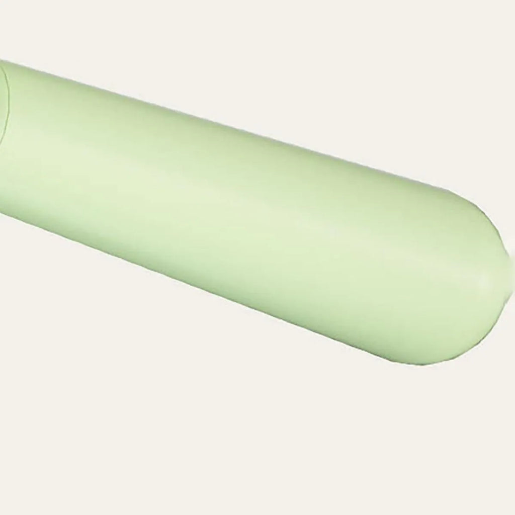 Blue dinosaur-shaped self-cleaning cat brush with double-sided stainless steel slicker pins.