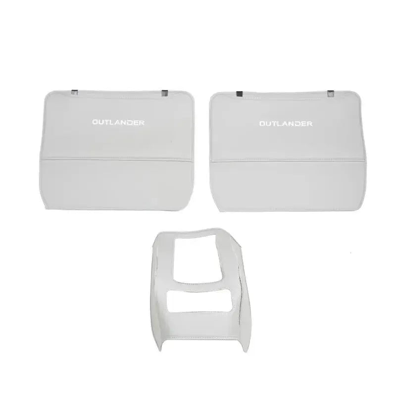 Three leather anti-kick pads for Mitsubishi Outlander seat and console protection.