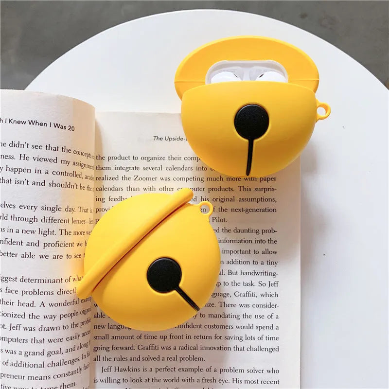 Yellow bell-shaped silicone protective case for AirPods 1 and 2 generation headphones.