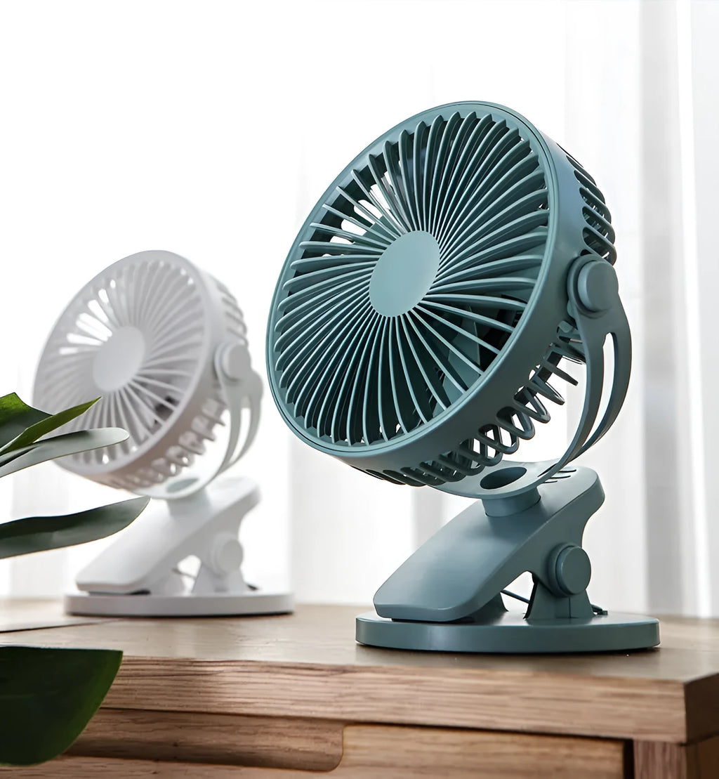 USB mini clip fan in white with 165mm fan head clamped onto a desk edge