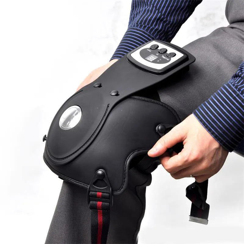 Knee massager with infrared heat, knee pad, shoulder pad, and 12V power adapter.