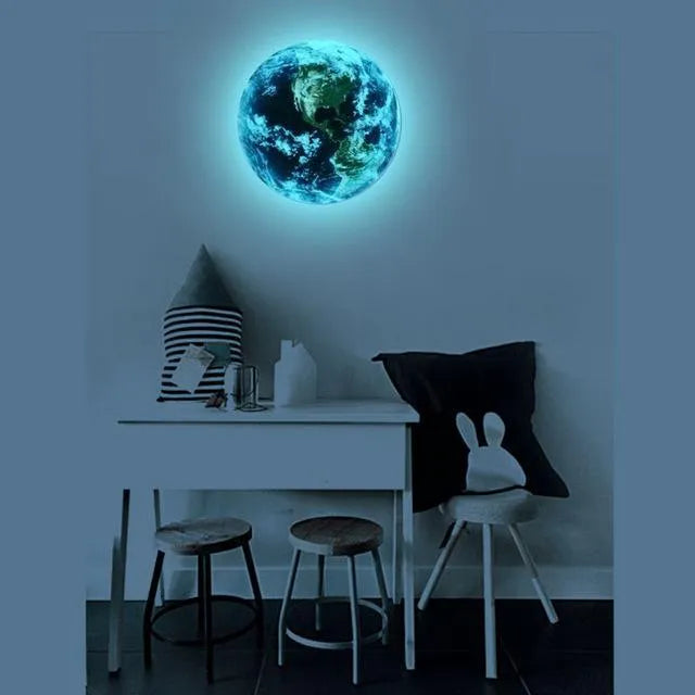 Glow in the dark 3D Earth planet wall sticker in three size options on a dark background
